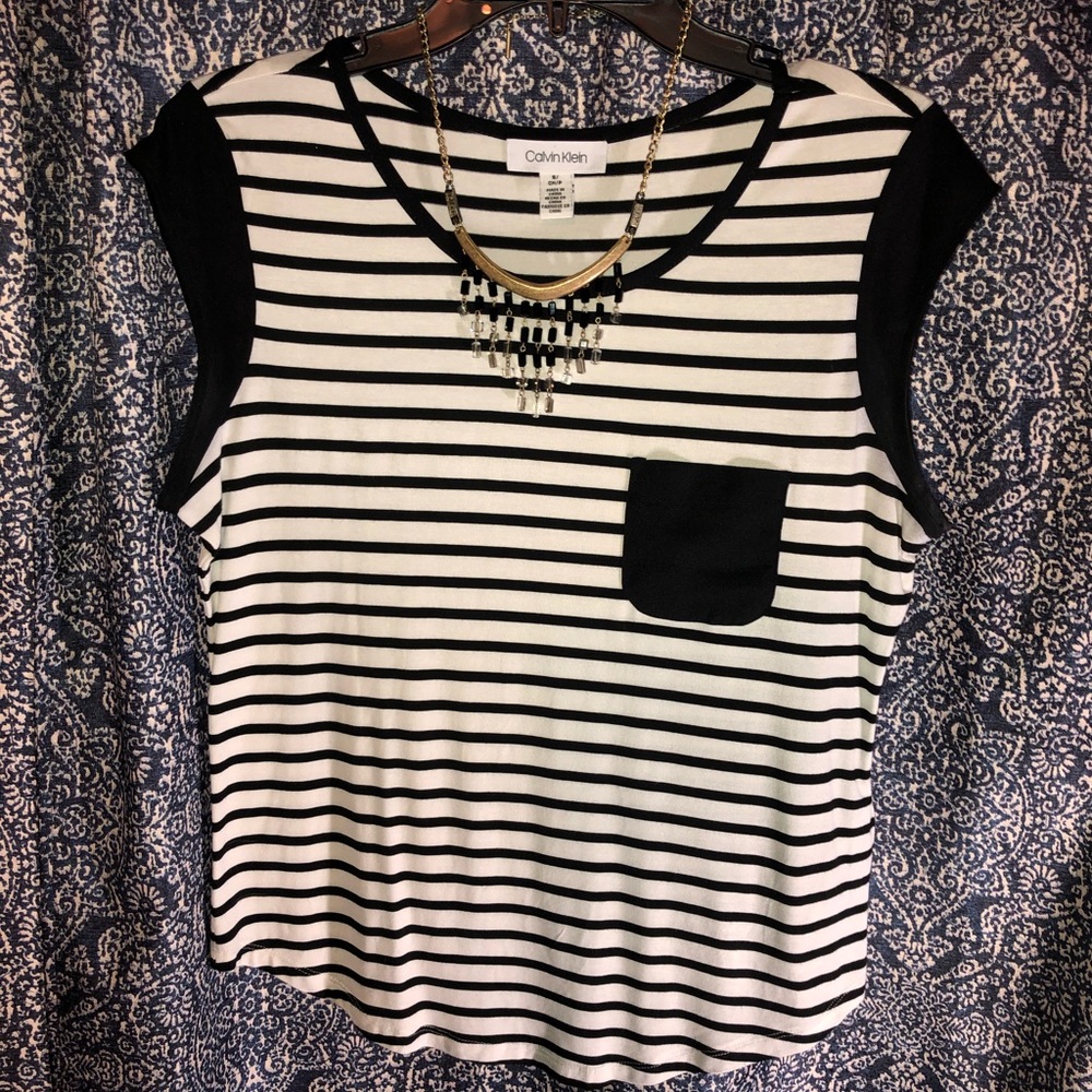 Calvin Klein shirt. Never worn. Was too small.